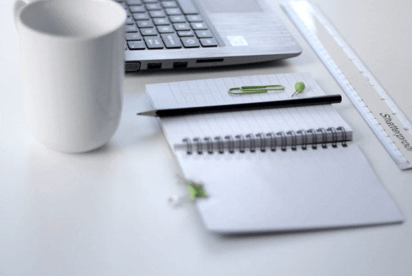 social tools illustrated pen notebook cup laptop computer